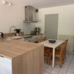 Modern fully equipped kitchen in a French host family home in Eybens near Grenoble.