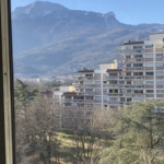 View of the park and mountains from the student's bedroom in Christiane's homestay in Grenoble.