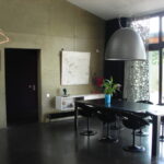 Modern open-plan dining area in a contemporary French host family home near Grenoble.
